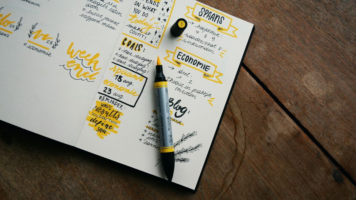 Hand-drawn business plan notes on a desk