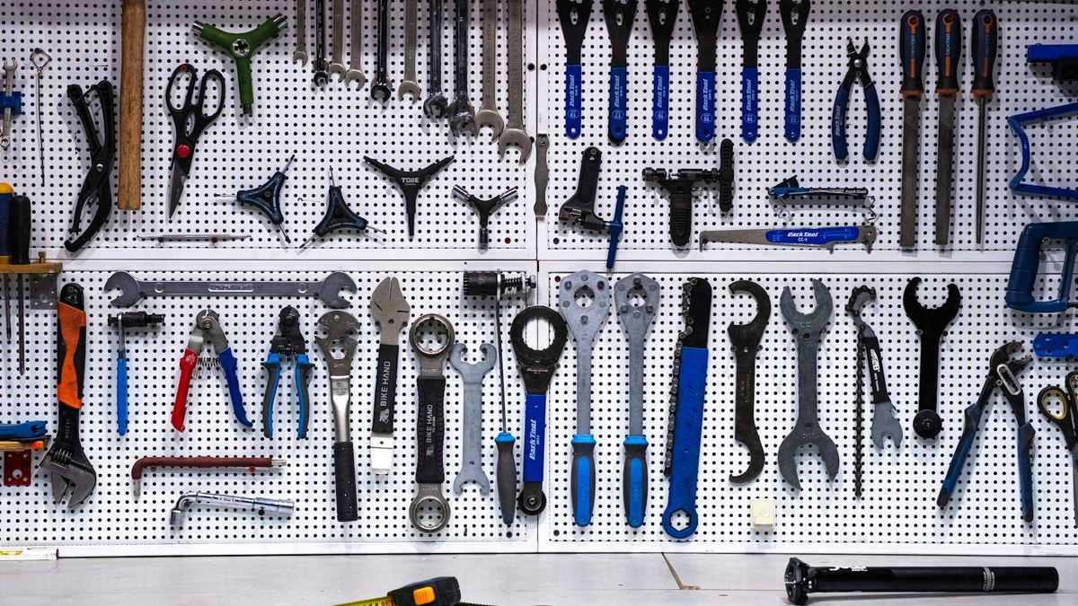 Wall of neatly organised hand tools
